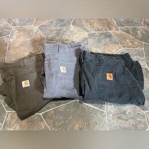 3 pair of Carhartt Men's work Pants - Black, Gray, Brown